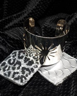 Solal Bijoux Haute Fantaisie machette avec manchon réversible argent et imprimé animal noir et argent